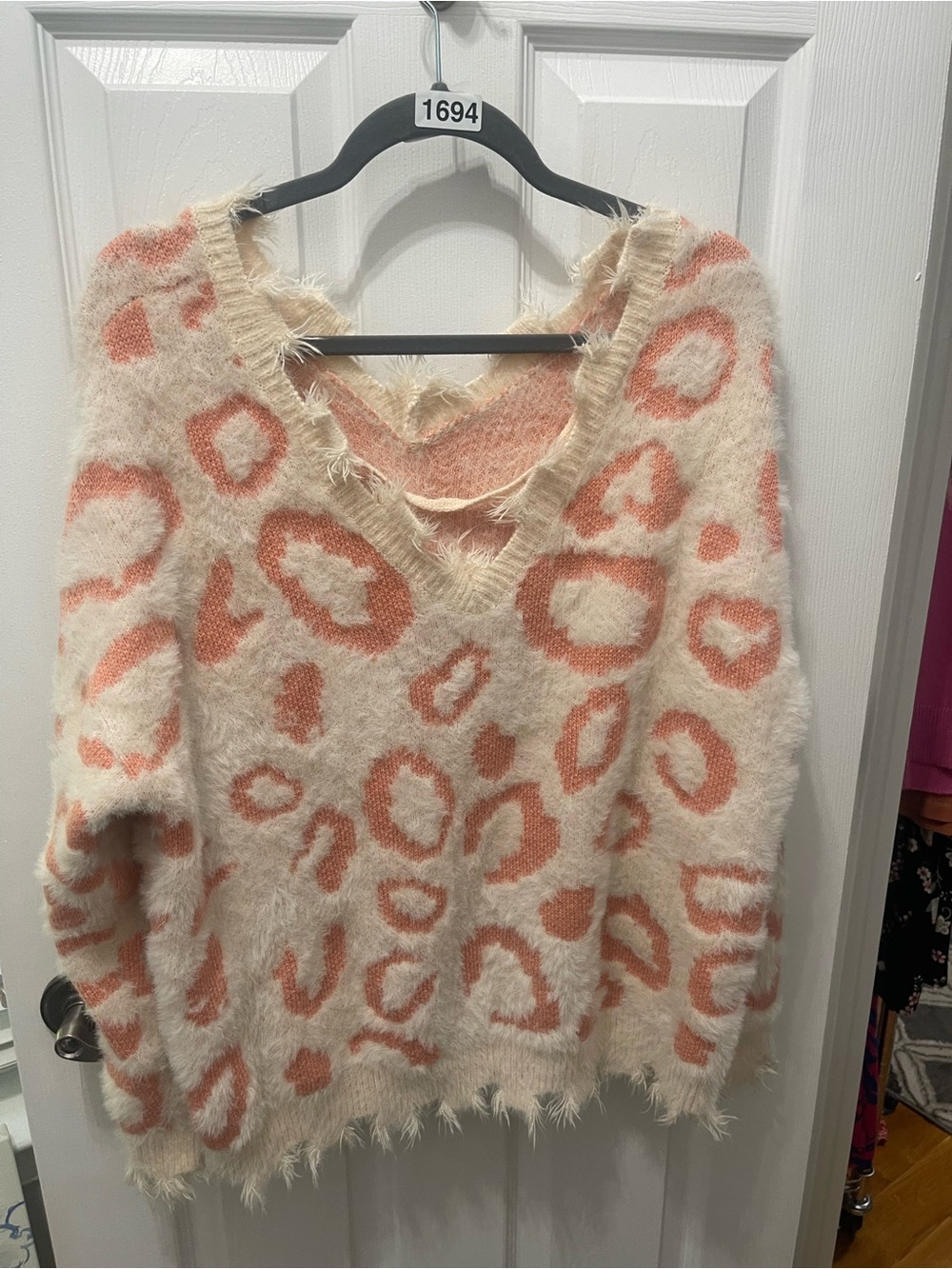 Soft Cream V-Neck Sweater with Coral Leopard Print